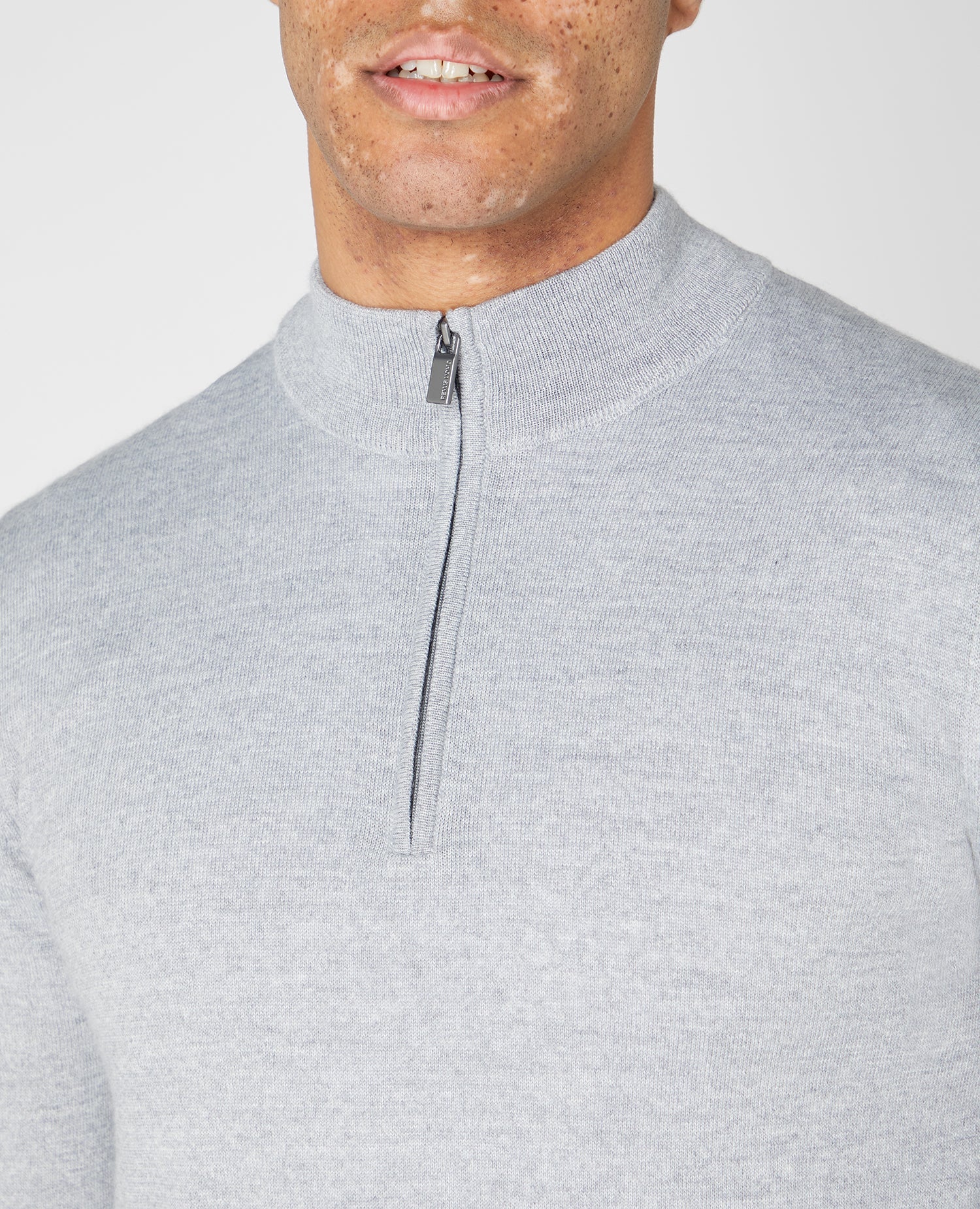 Tapered fit Merino Wool Half Zip Sweater